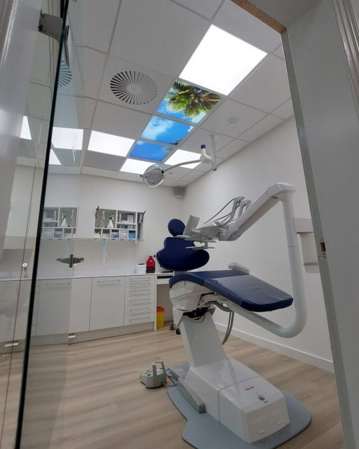 Dental treatment room lighting for Dentist. LED lighting and photo panels