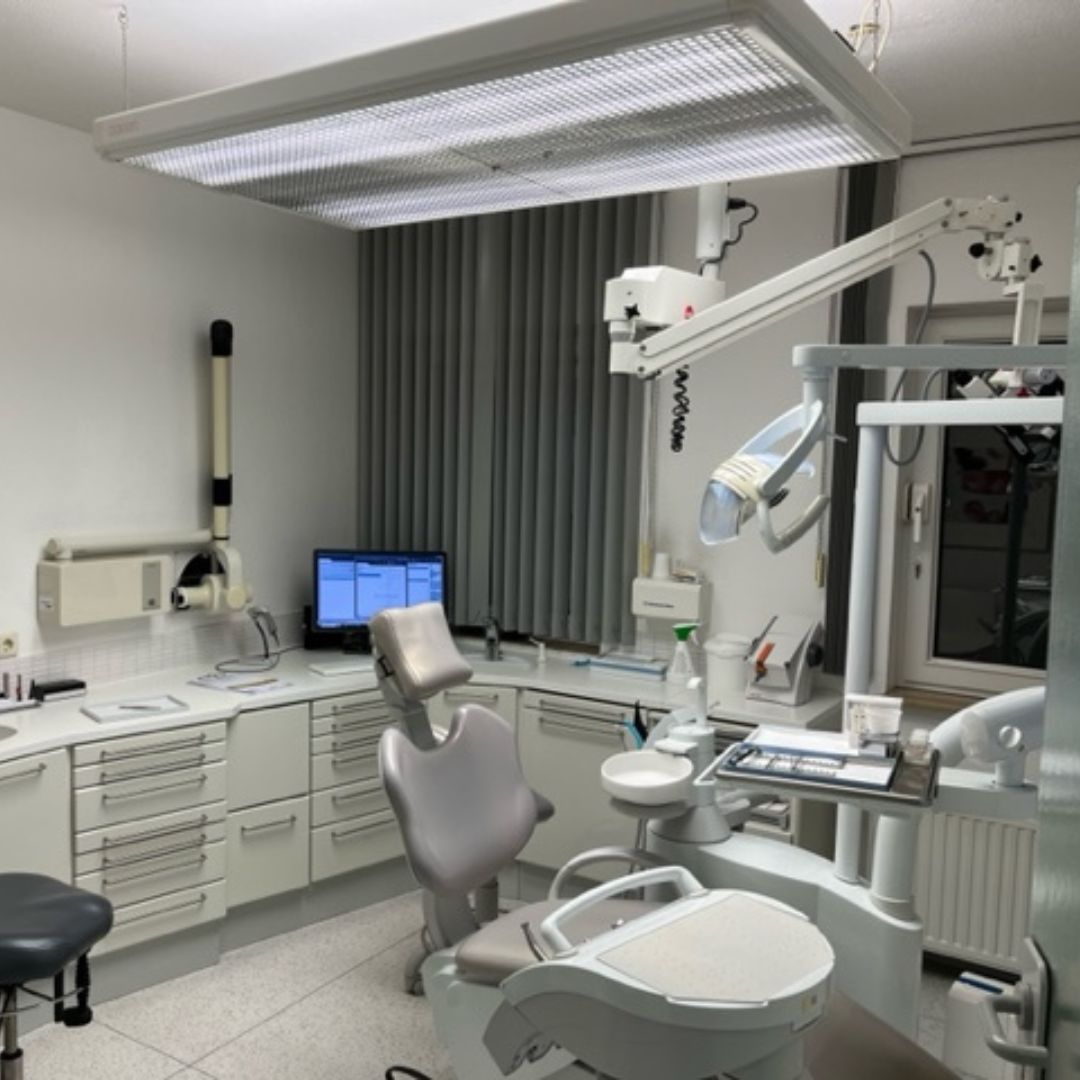 Before: Old Fluorescent lighting fixture in dental treatment room.