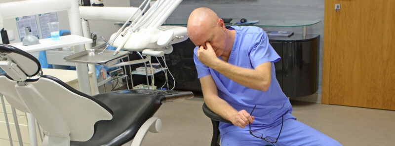 Tired dentist treatment room lighting