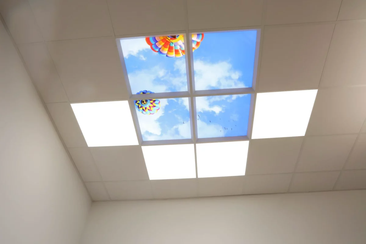 M+W Dental (Müller und Weygandt GmbH) showroom in Büdingen showcasing A-dec dental chairs under Dentled full-spectrum daylight LED lighting.