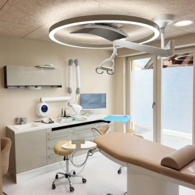 Dentled PVR150 full spectrum daylight ring light installed above dental chair at Dr. Dominguez Dental Clinic treatment room.