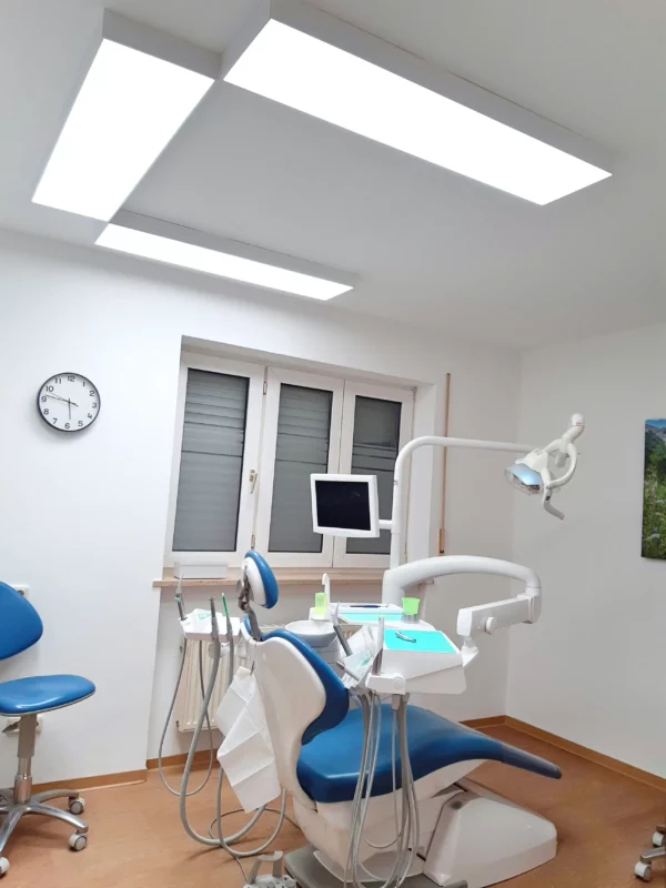 Three treatment rooms equipped with Dentled DL120 full-spectrum lighting for accurate dental procedures
