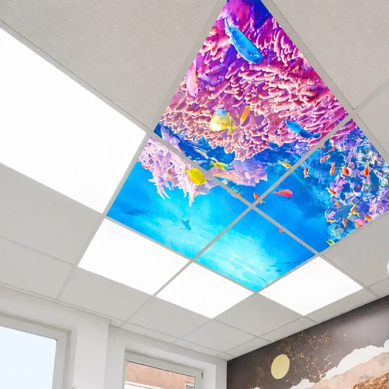 Dental treatment room at Dr. Nicola Deppe Dental Practice illuminated with Dentled DL62 full-spectrum daylight LED panels and custom underwater ceiling photo panels.