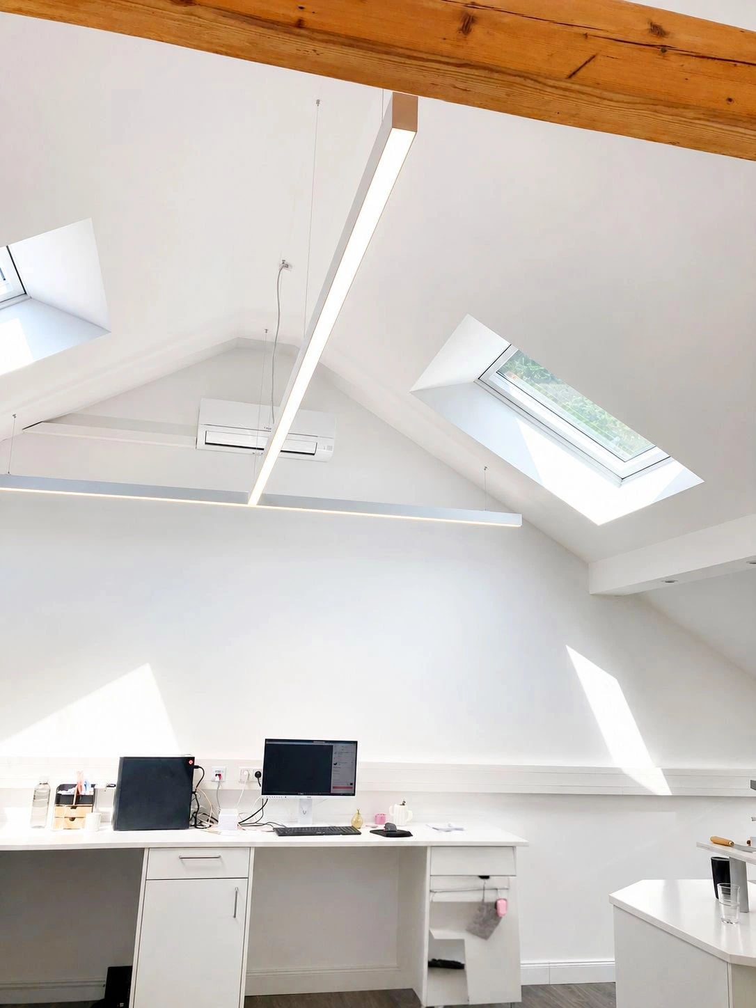 Modern dental laboratory illuminated with 5000K full-spectrum LED lighting for precision dental manufacturing and implantology.