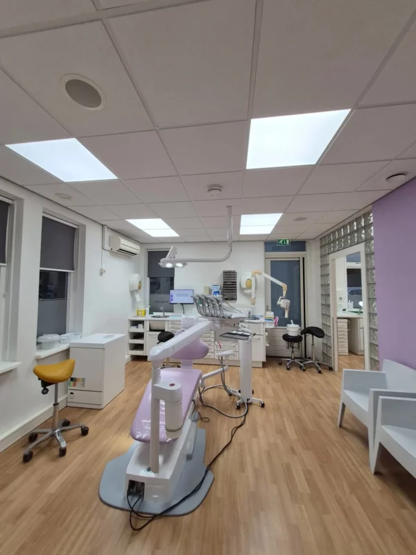DentLED DL60 panels providing bright, uniform daylight lighting in a dental treatment room