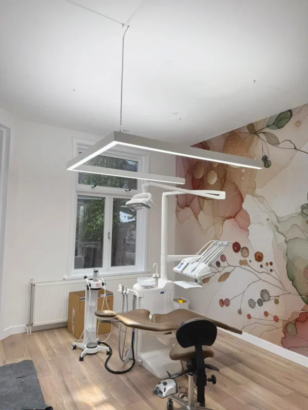 Dentled PHU 5000K daylight LED lighting with high colour rendering in a modern dental treatment room in The Hague.