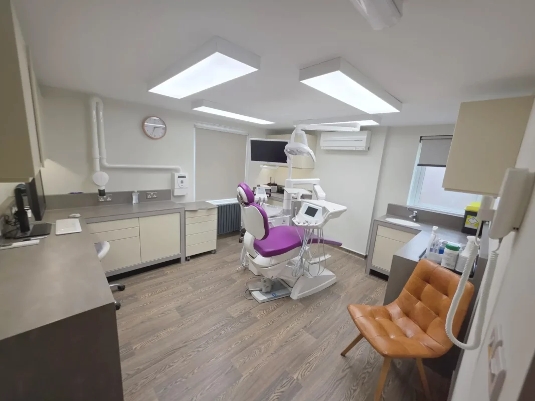 Dental treatment room at Priory Dental Care featuring DentLED DL120 full daylight spectrum LED panels replacing fluorescent lighting.